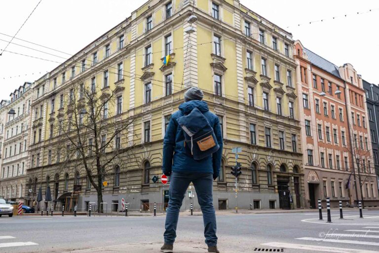 james stands in the streets of riga during a 3 day trip