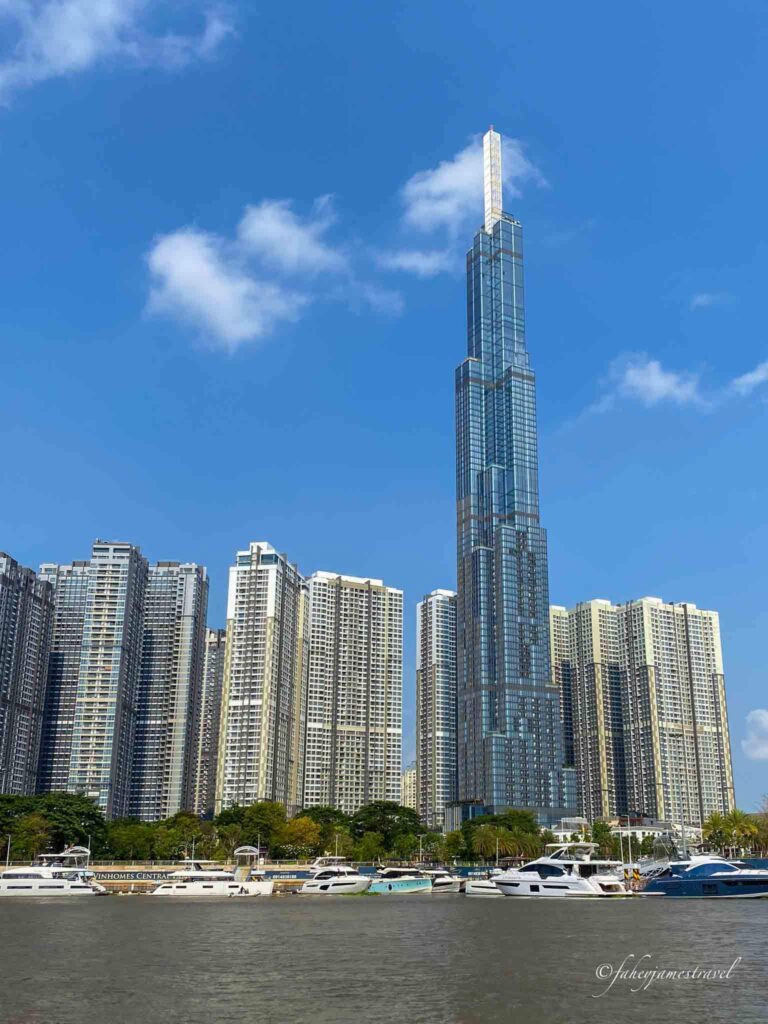 ho chi minh city is pictured along the river ferry and pictured is Landmark 81