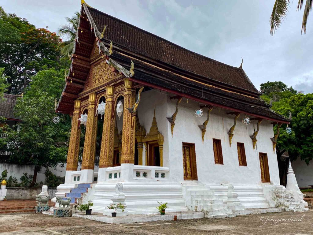 side angle Wat Siphoutthabat Thippharam is pictured and is one of the temples in luang prabang