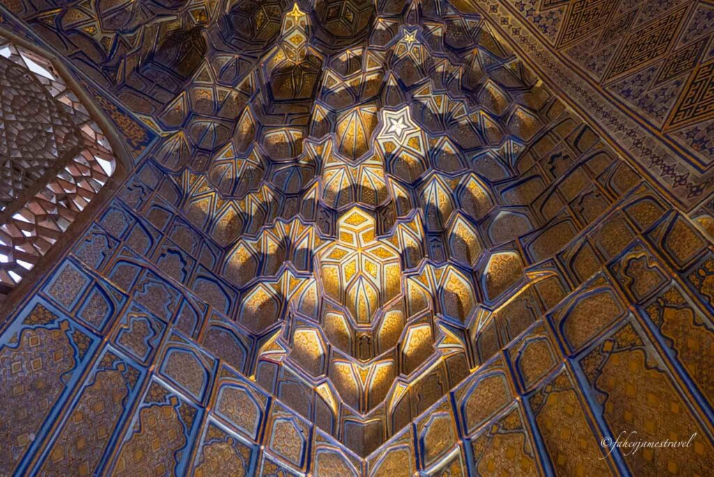 inside Gur-e-Amir Mausoleum is pictured with blue and yellow colours 