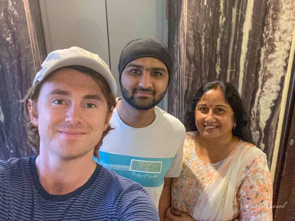 james with some strangers in a hotel in jaipur for 2 day trip