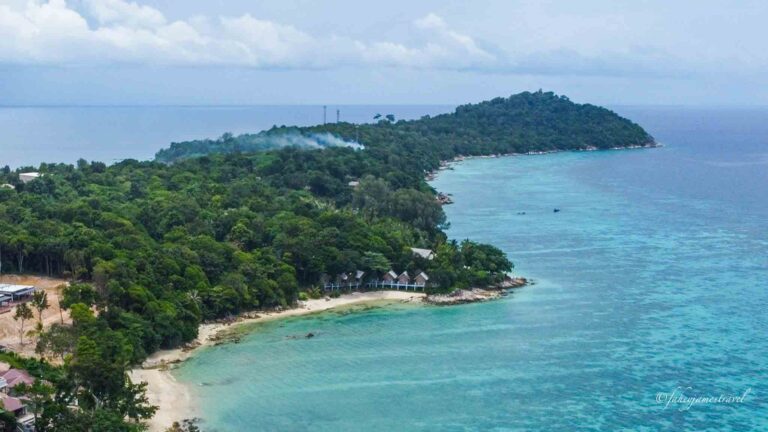 koh lipe north point beach with transparent water and green vegetation. Water is seen all around the island