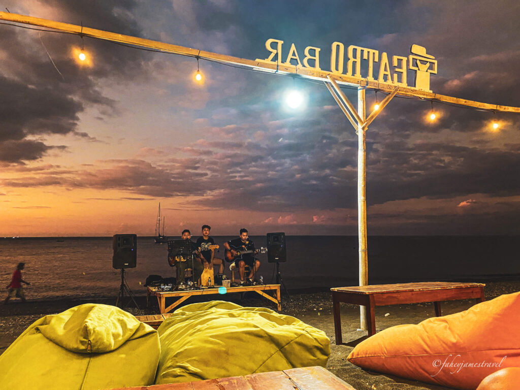 live music on pantai amed as the sun sets is a nice experience 