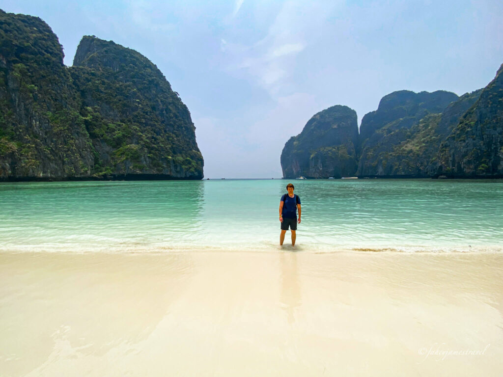 kames stands on maya beach on koh phi phi 