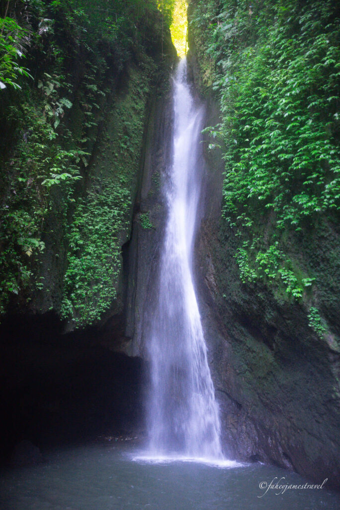 leke leke waterfall shows. close up shot of the water falling below into the pool