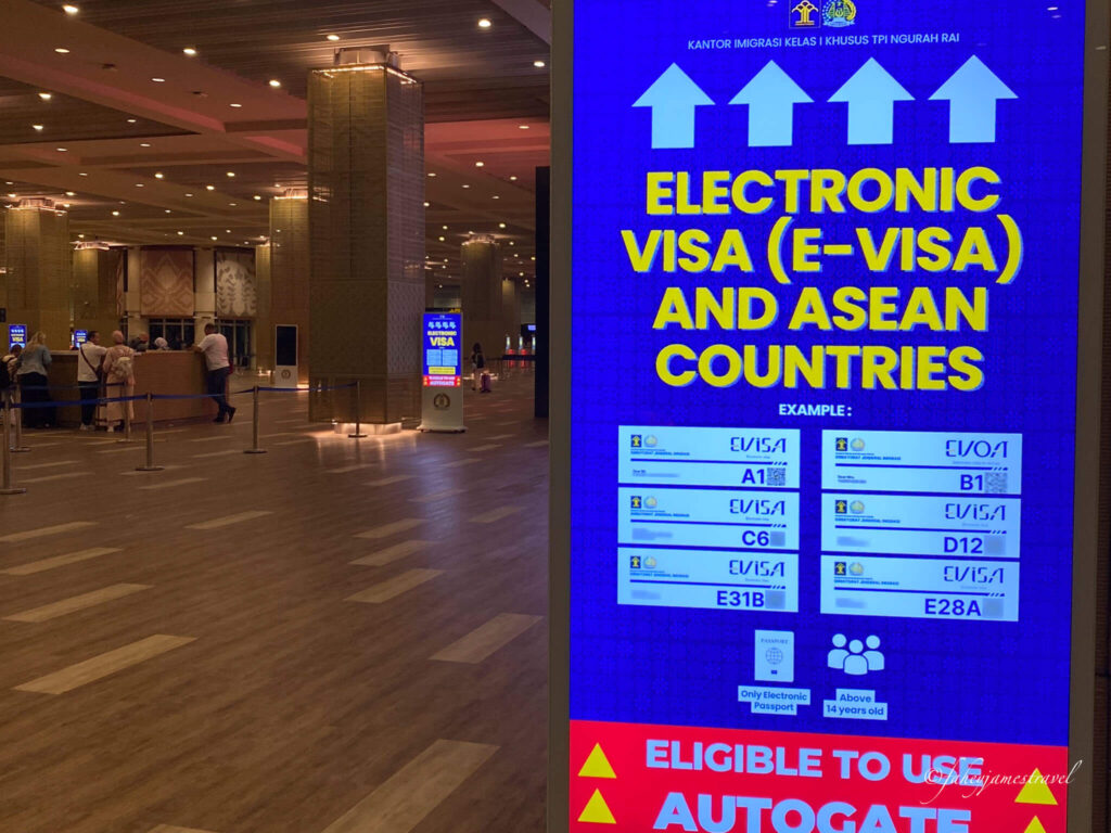 in bali airport the sign shows where people can get the visa on arrival