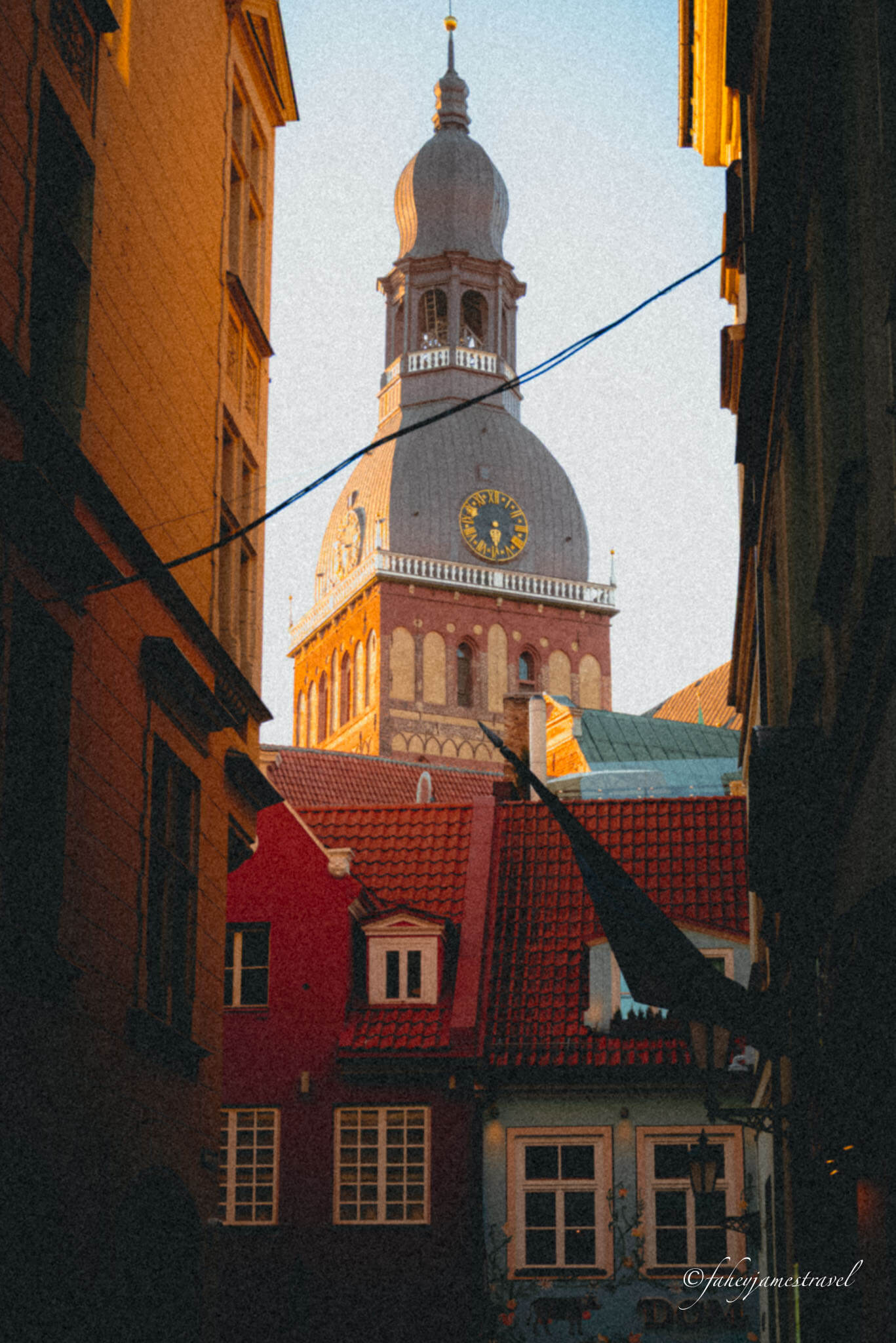one of the riga buildings is pictured through the street