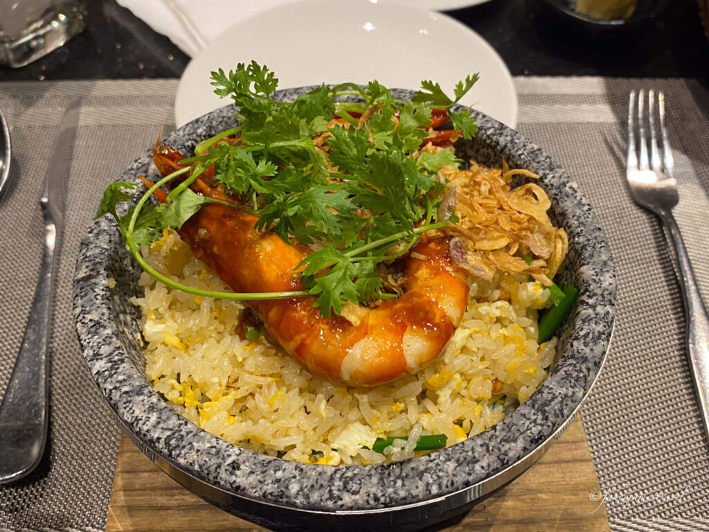 at Six Degrees the food pictured is prawns and fried rice