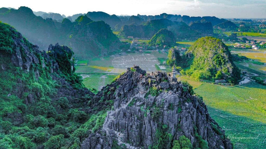things to do in ninh binh includes hang mua cave pitctured