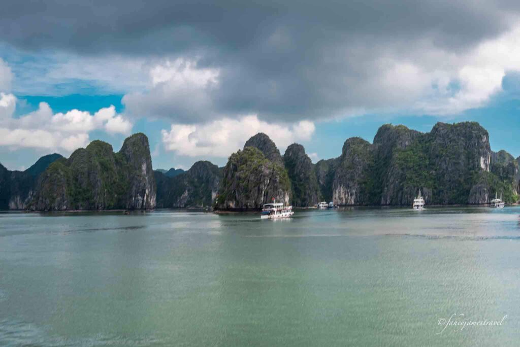 limestone cliffs are pictured in cat ba