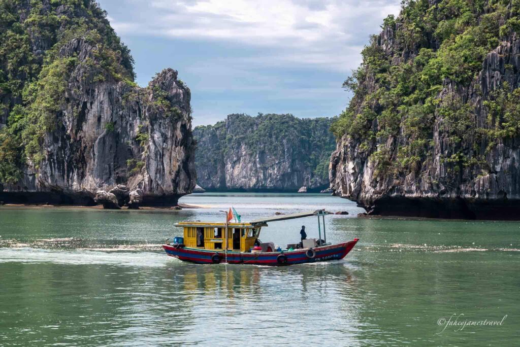 limestone cliffs of lan ha bay close to cat ba island