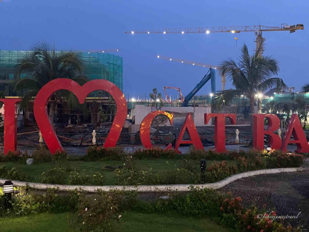 big red sign shows i love cat ba
